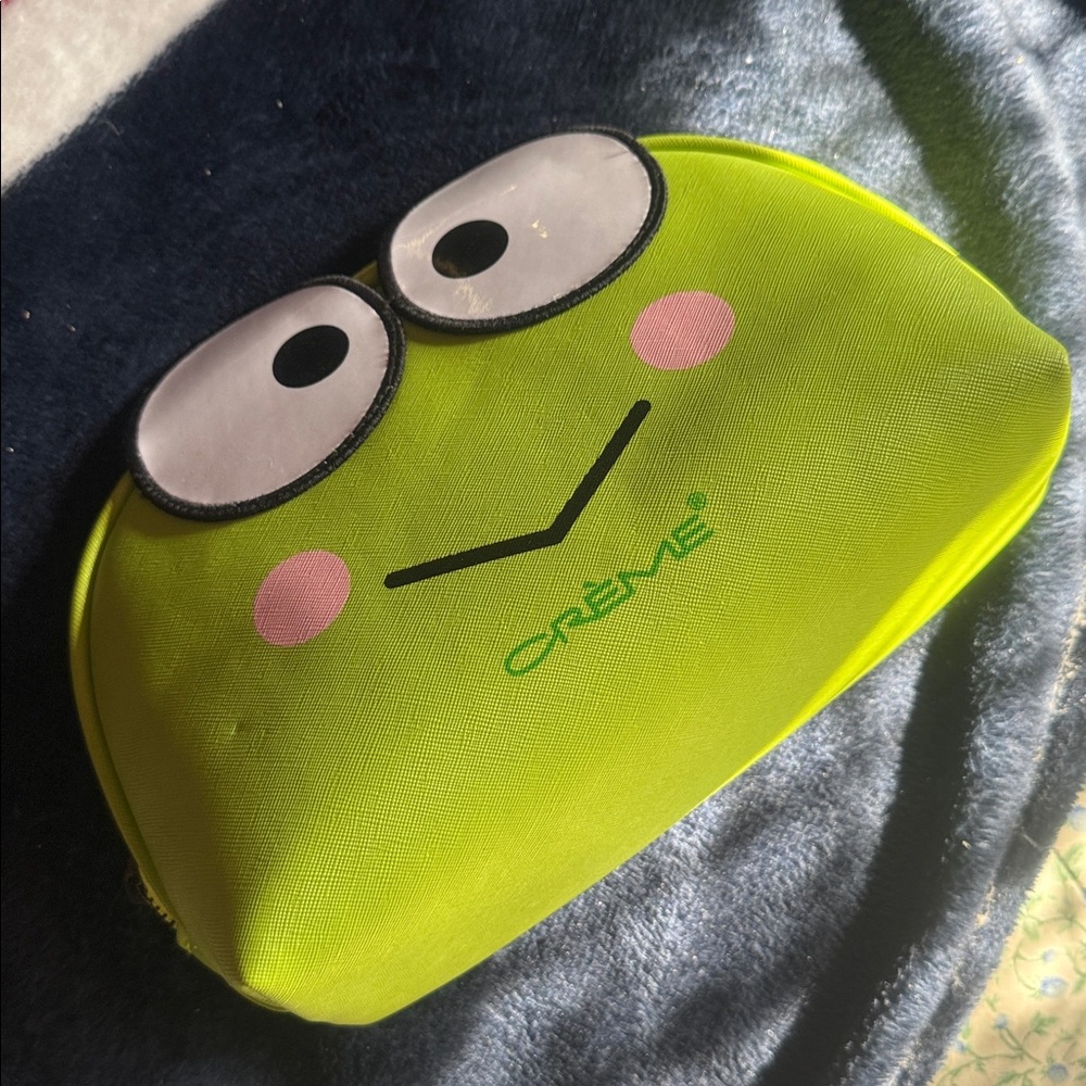 Creme Green Cosmetic Bag with Cute Face Design